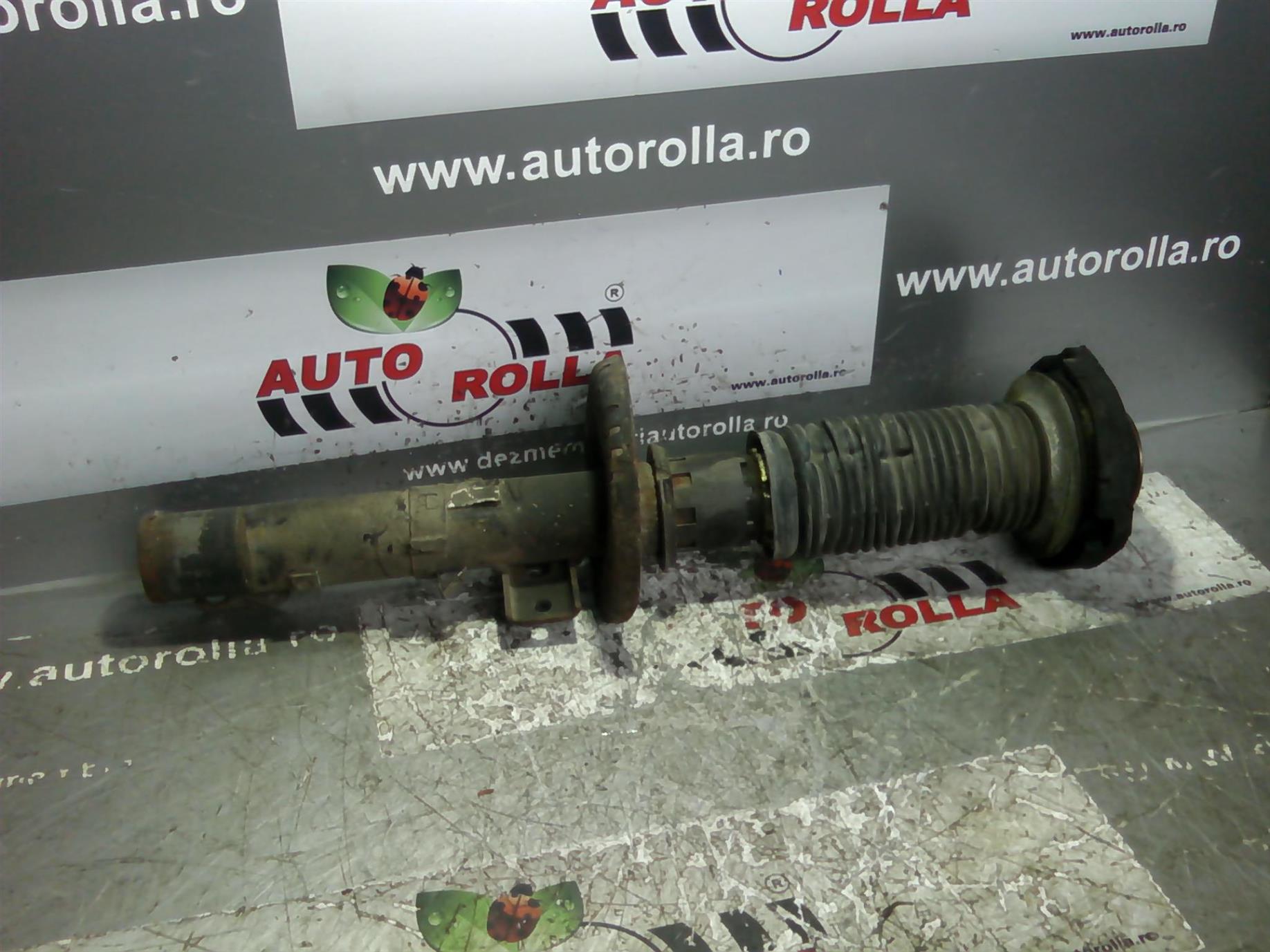 amortizor stanga fata si flansa Skoda Fabia, an 2001