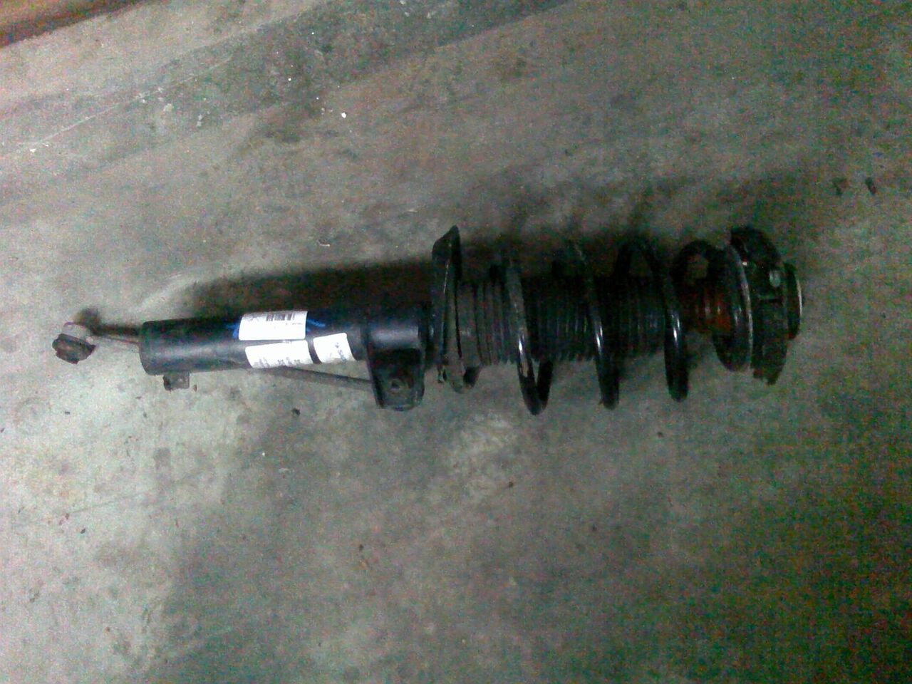 amortizor stanga fata complet Volkswagen Passat B6