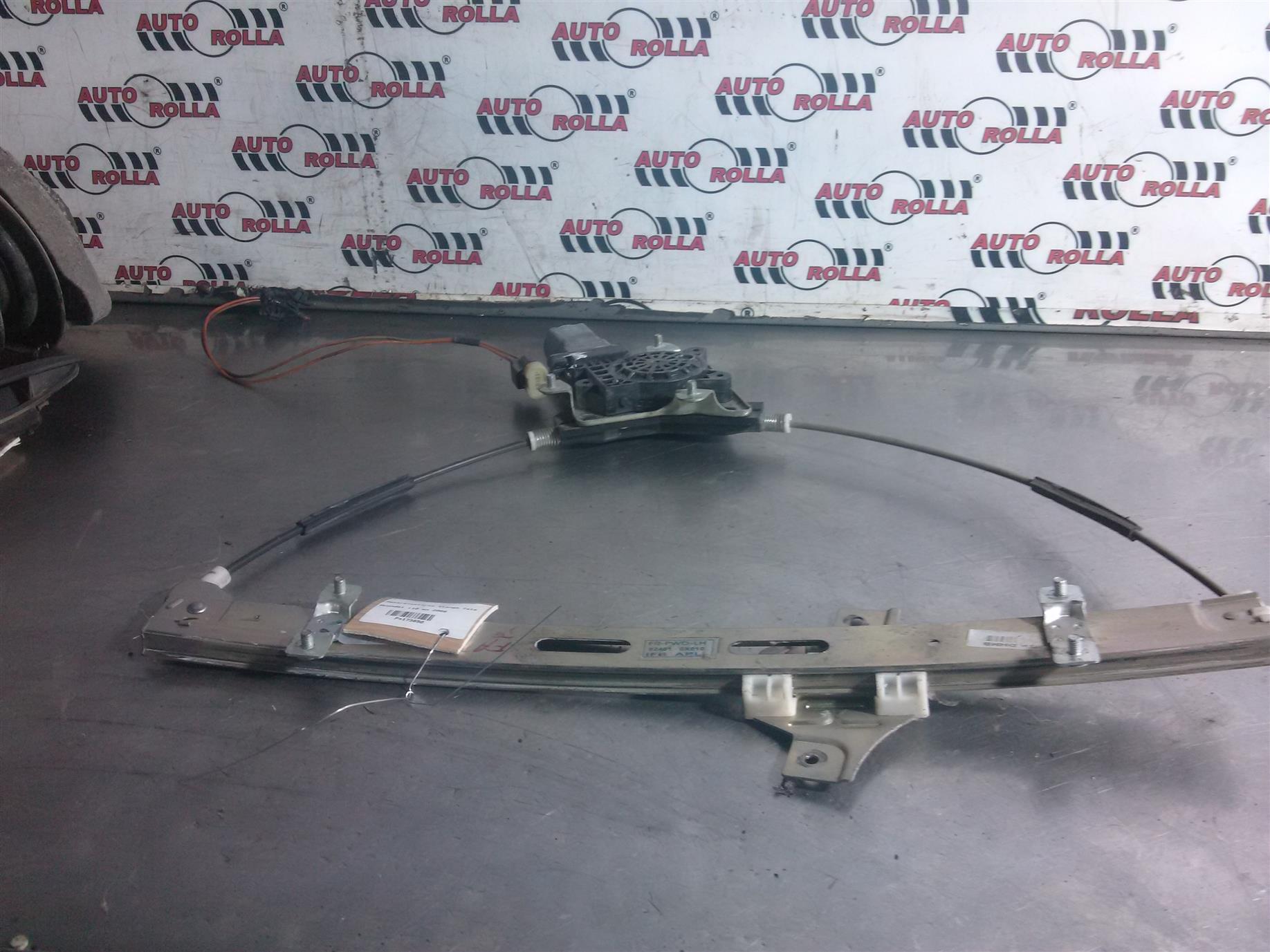 Macara+motoras stanga fata Hyundai i10 an 2008
