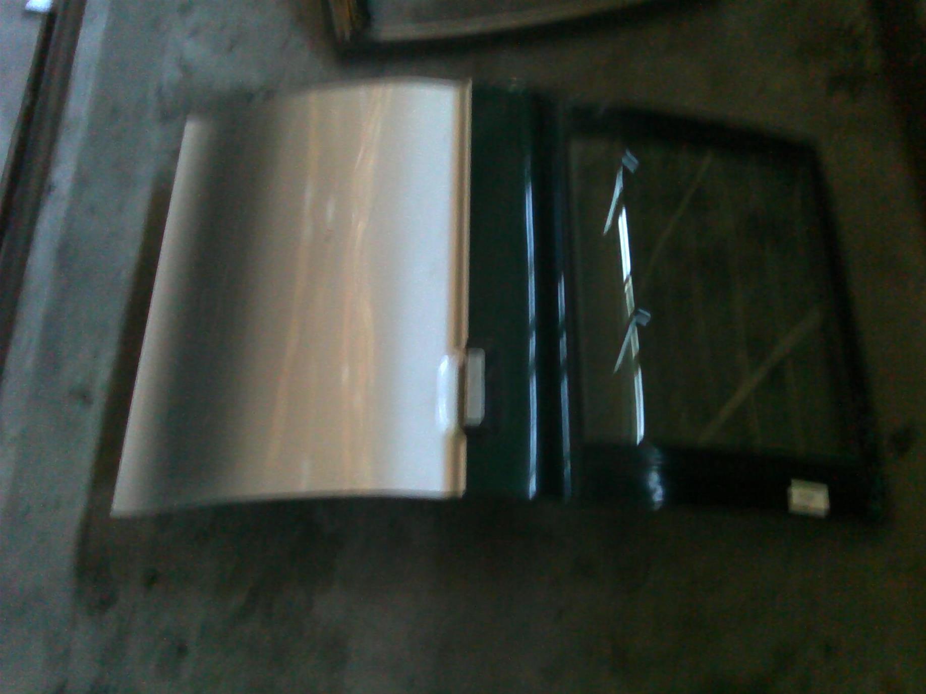 usa stanga spate completa Mitsubishi L200, an 2003