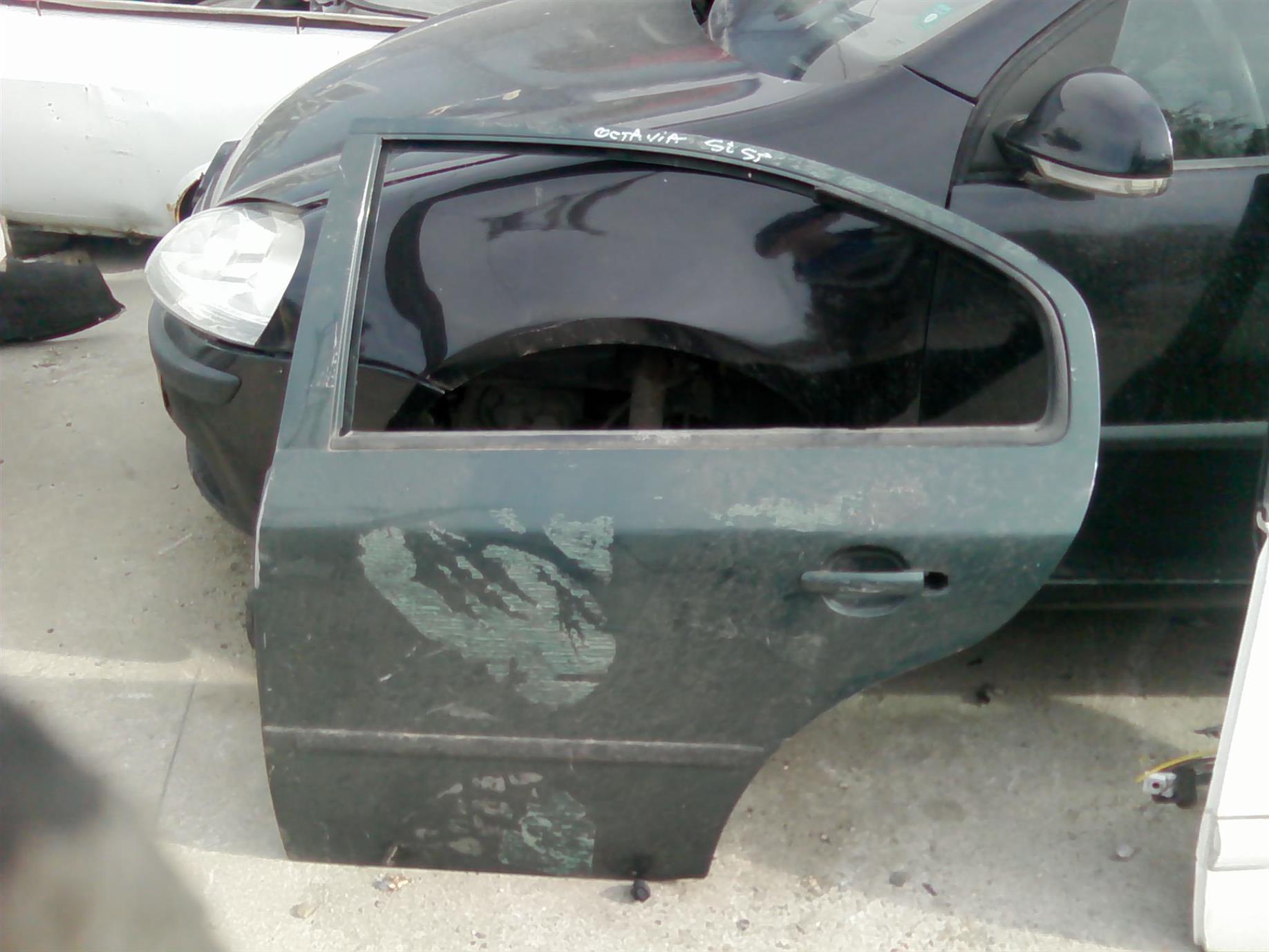usa stanga spate goala Skoda Octavia 1