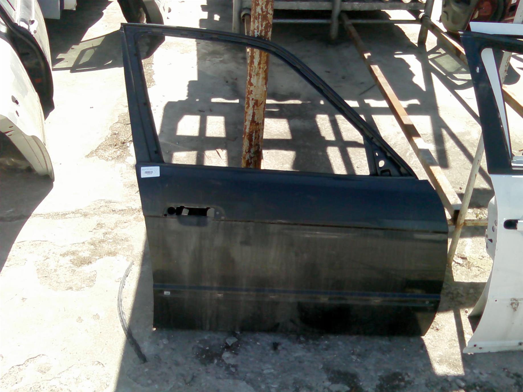 usa dreapta fata goala BMW E34