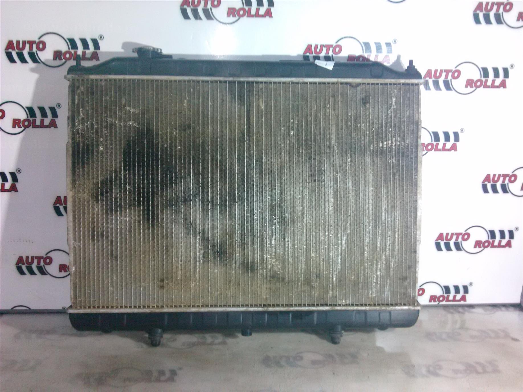 Radiator apa Nissan Navara 2.5D,an 2004