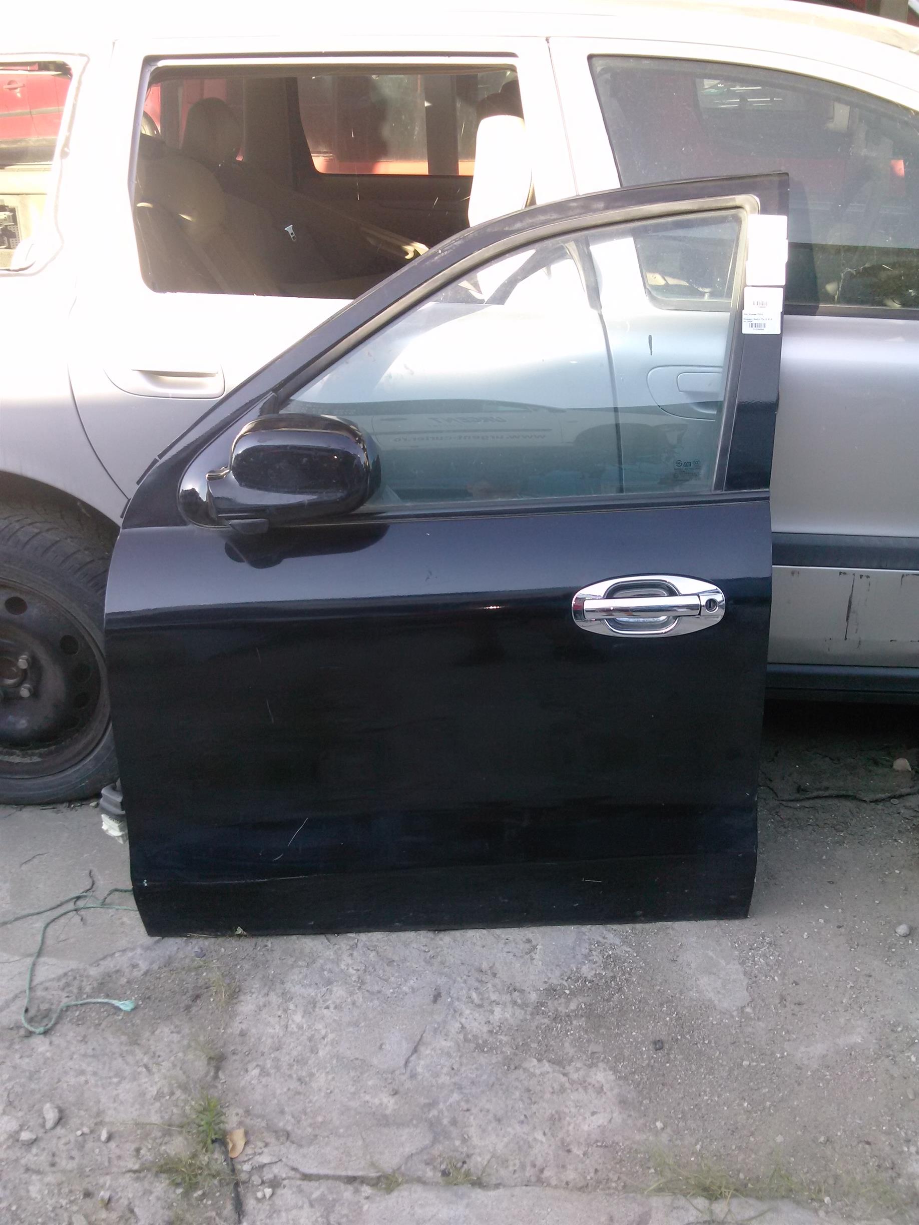 Oglinda stanga fata Hyundai Santa Fe 2.0 d, an 2004