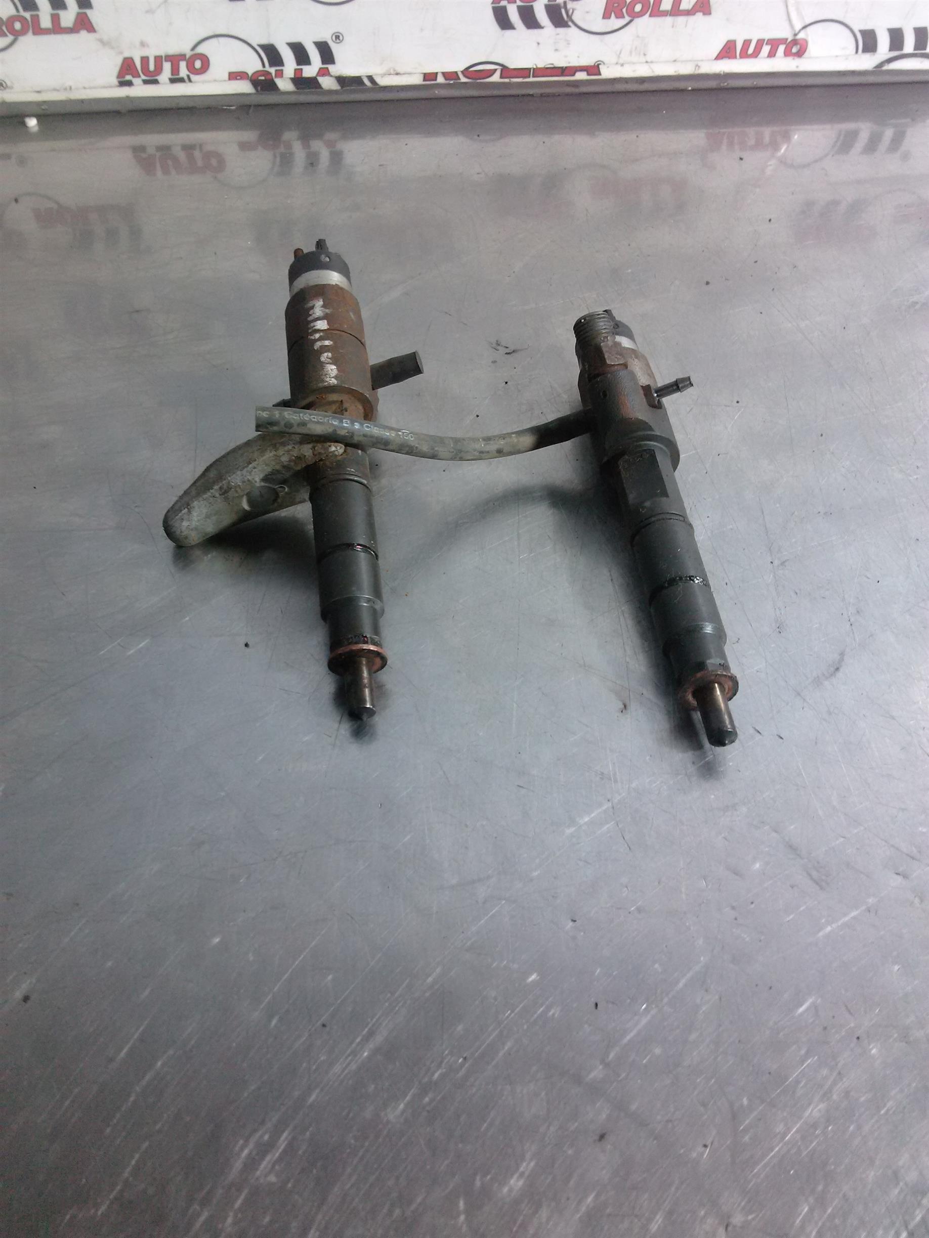 Injectoare 2 bucati Renault Midlum 270dci, an 2004