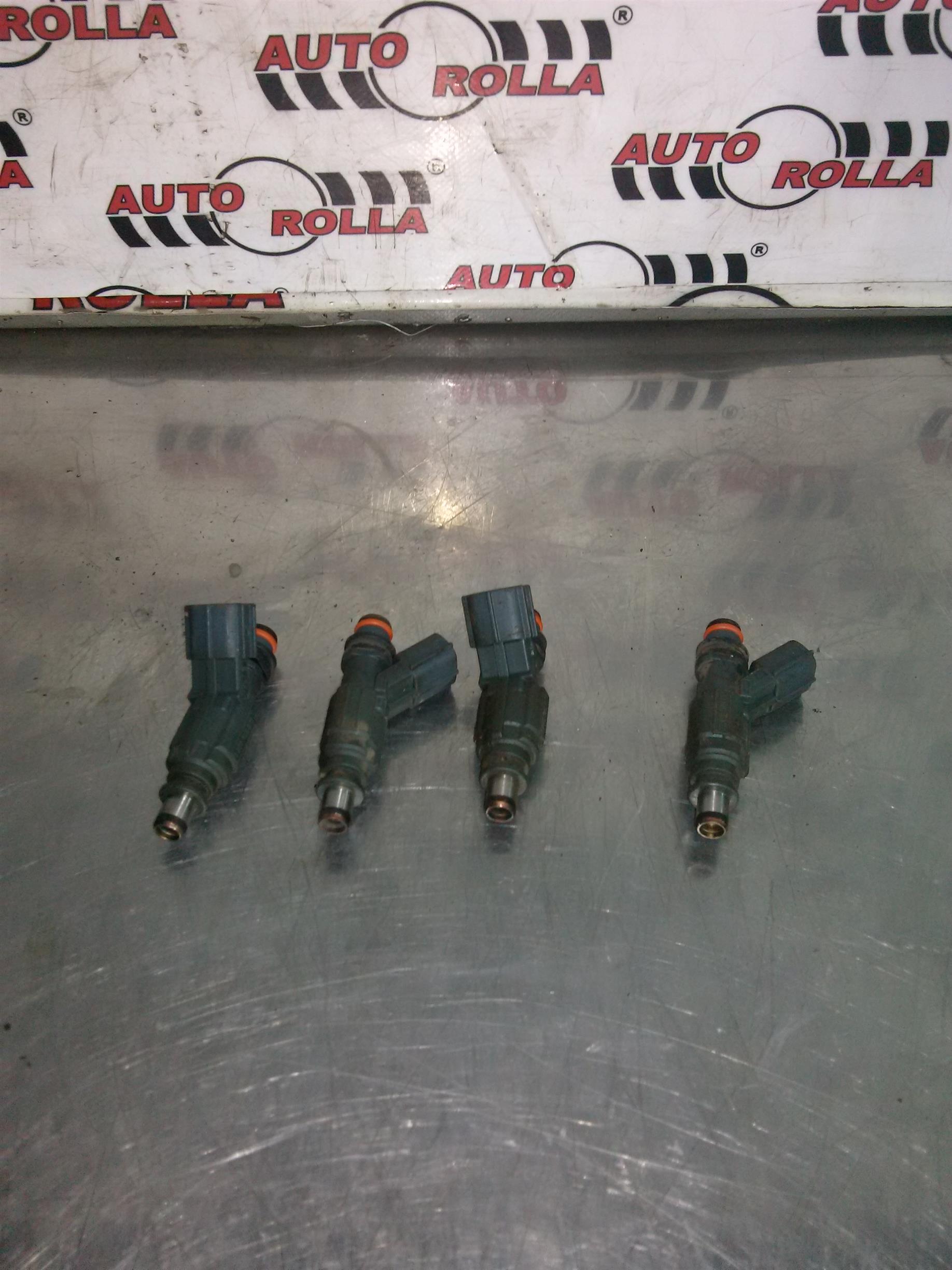Injectoare set Toyota Avensis 1.8s autom an 2005