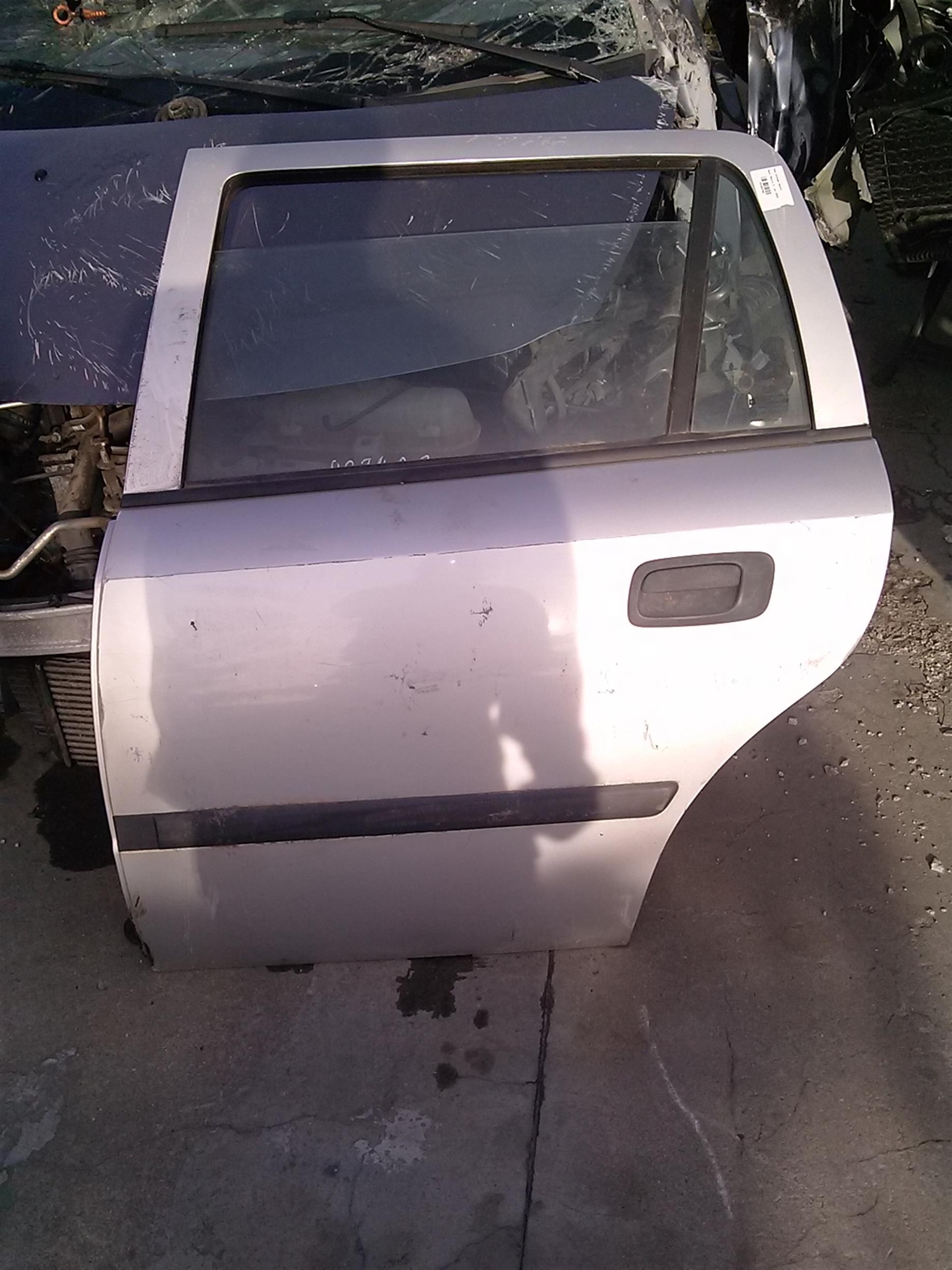 Usa stanga spate Opel Astra G, an 2002