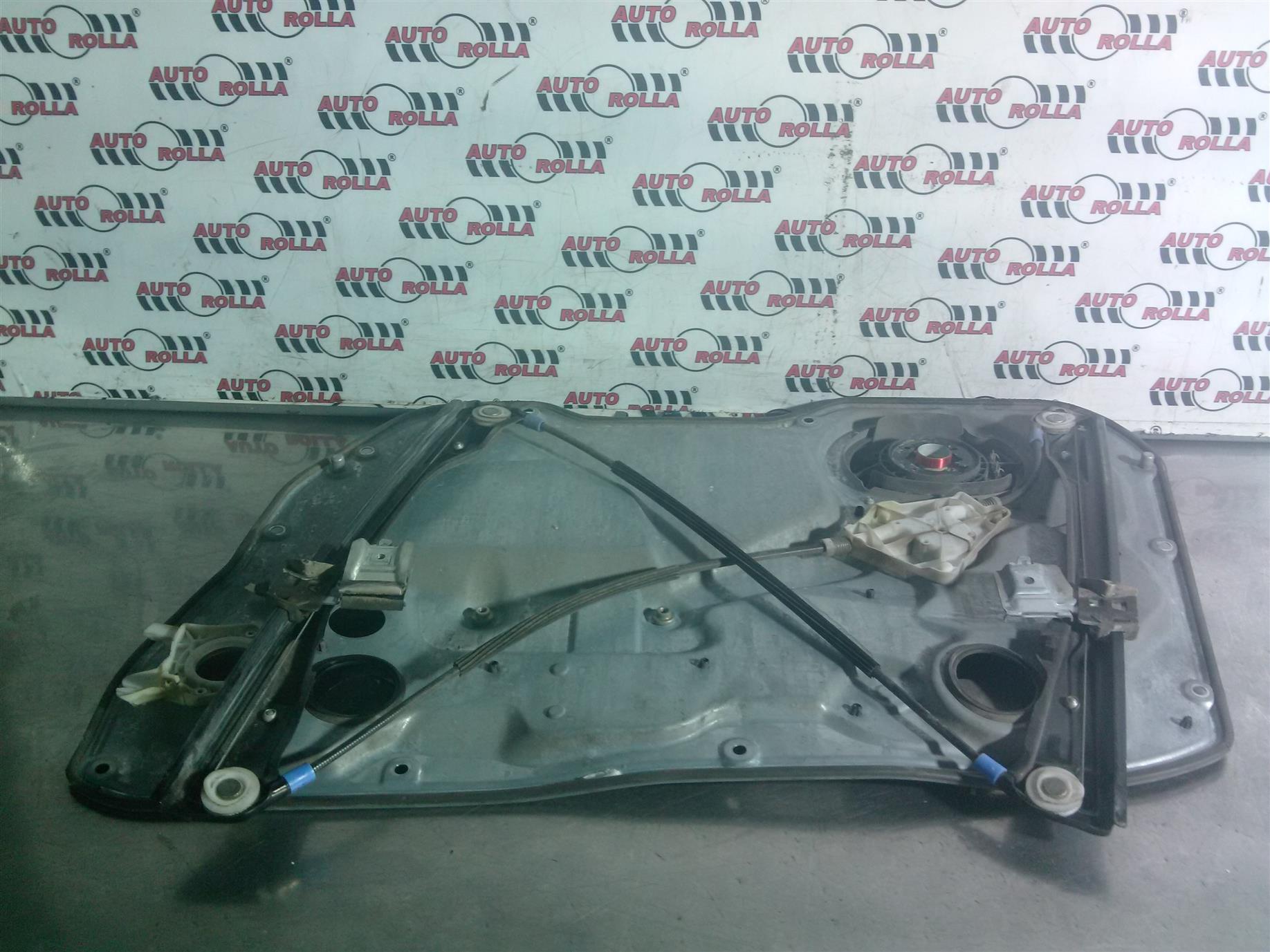 Macara +motoras stanga fata Seat cordoba an 2004