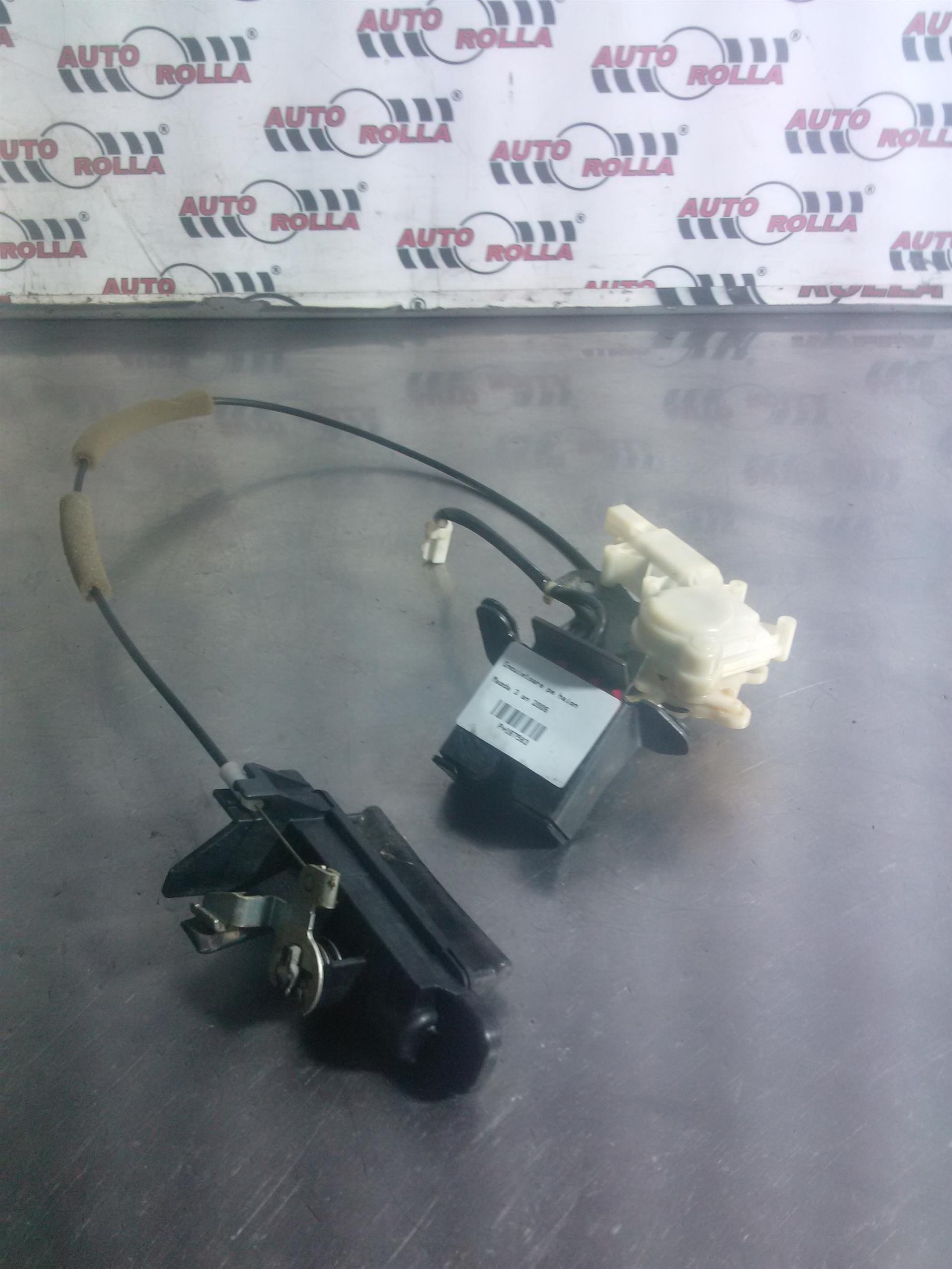Incuietoare pe haion Mazda 3 an 2006
