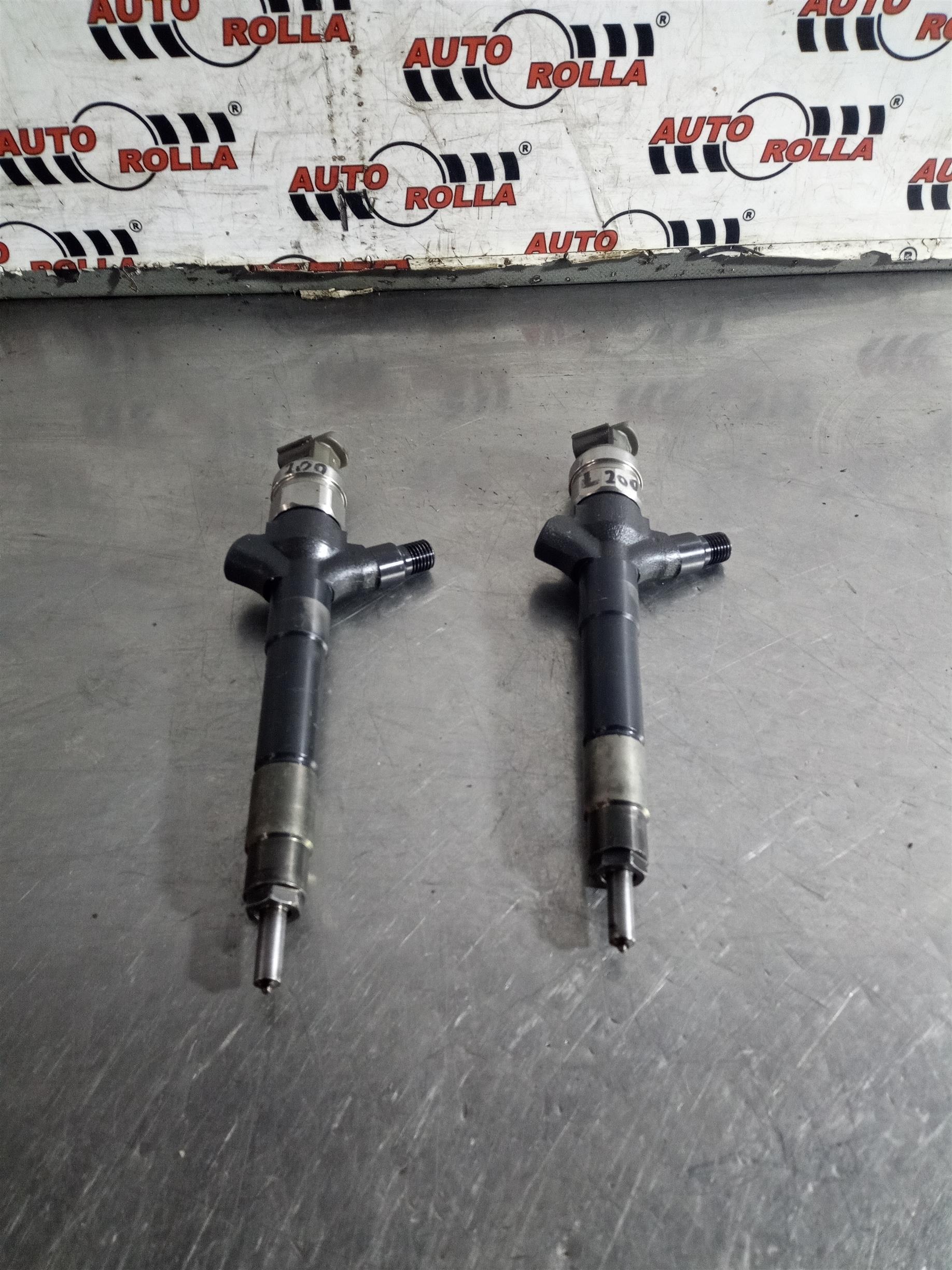 Injectoare 2 bucati Mitsubishi L200 ,2.5D ,EURO4