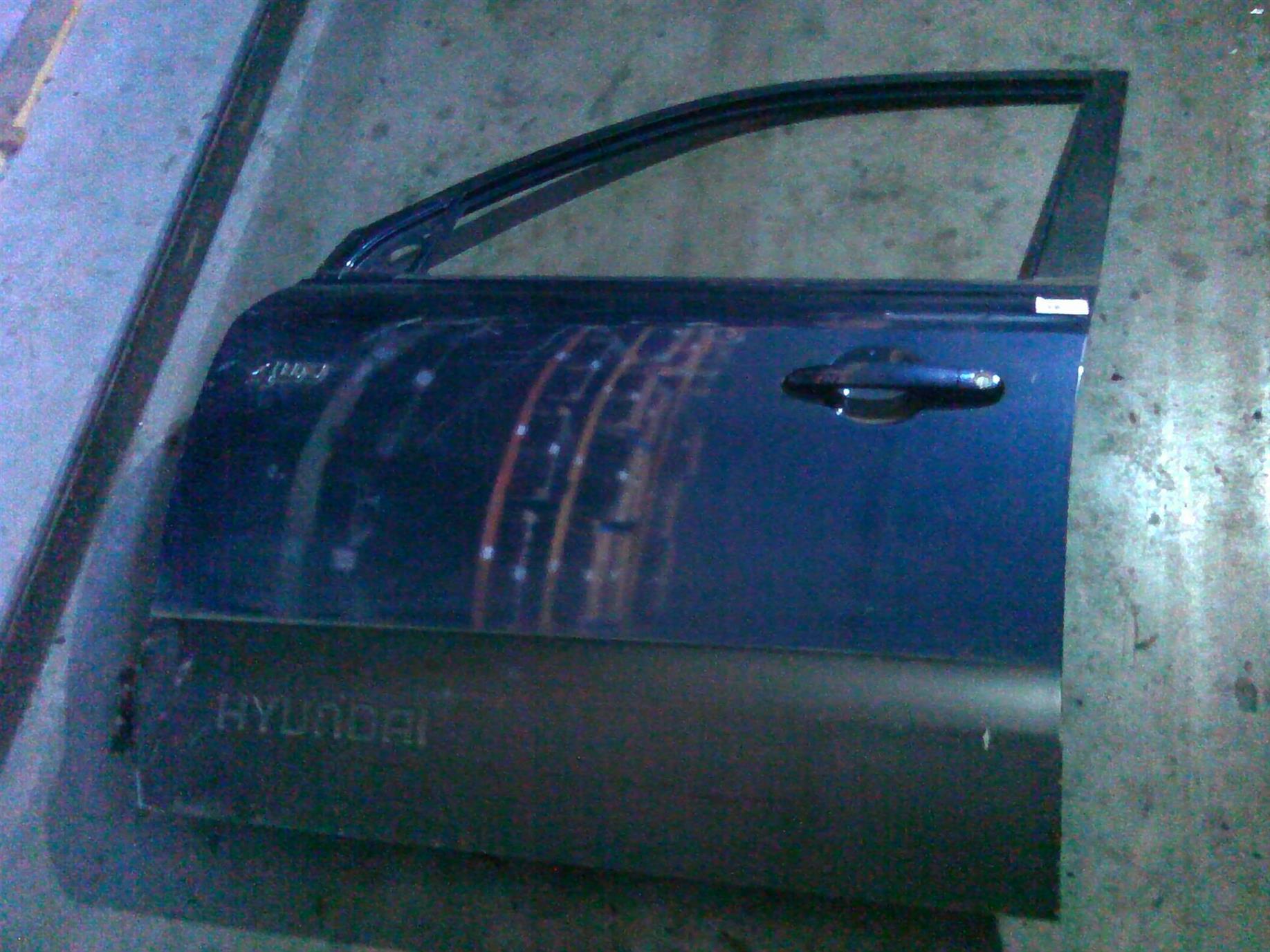 usa stanga fata si macara Hyundai Tucson, an 2004