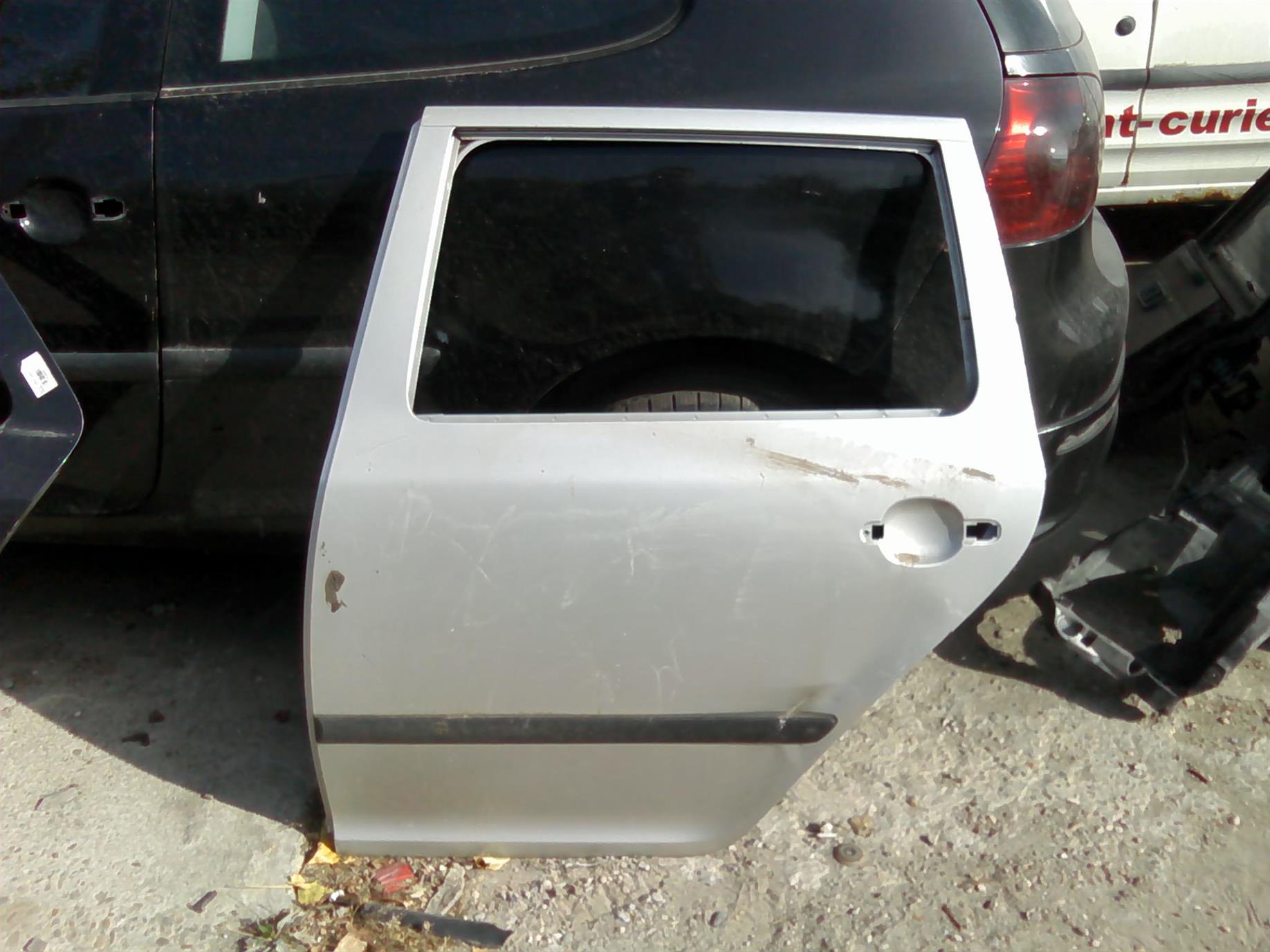 usa stanga spate goala Skoda Octavia 1