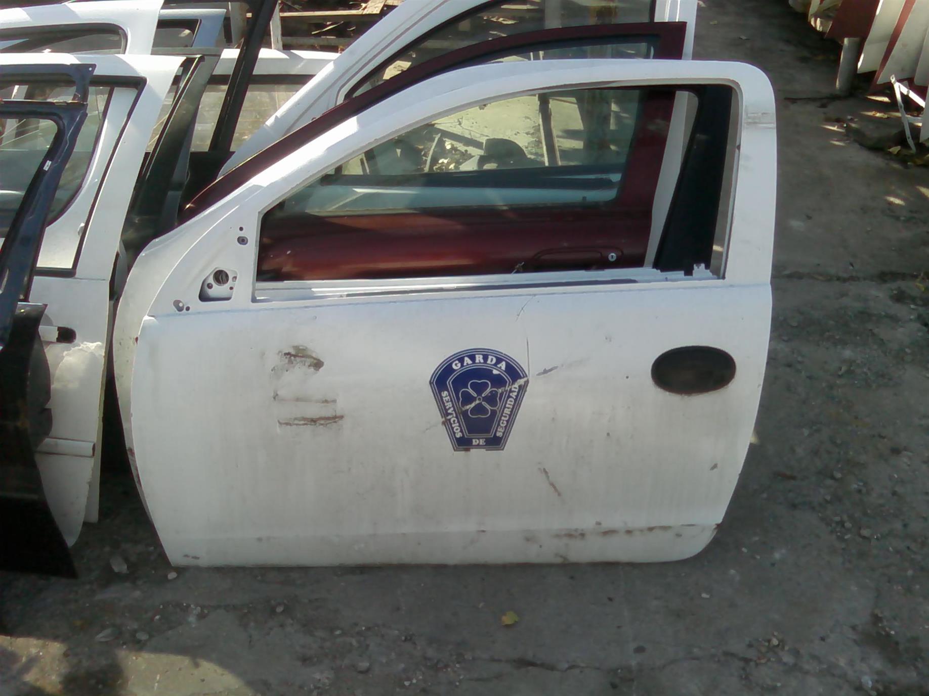usa stanga fata goala 2 usi Opel Corsa C