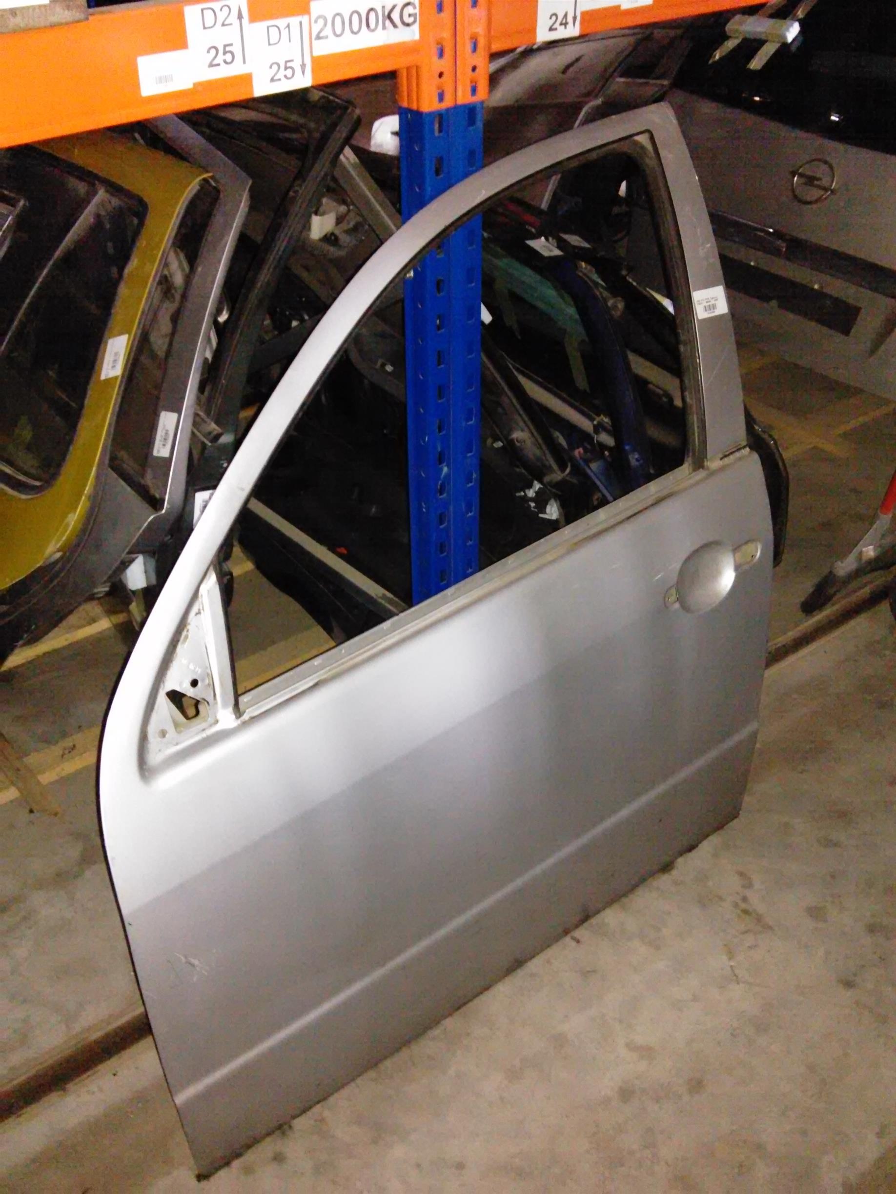 usa stanga fata goala Skoda Fabia, an 2006 break
