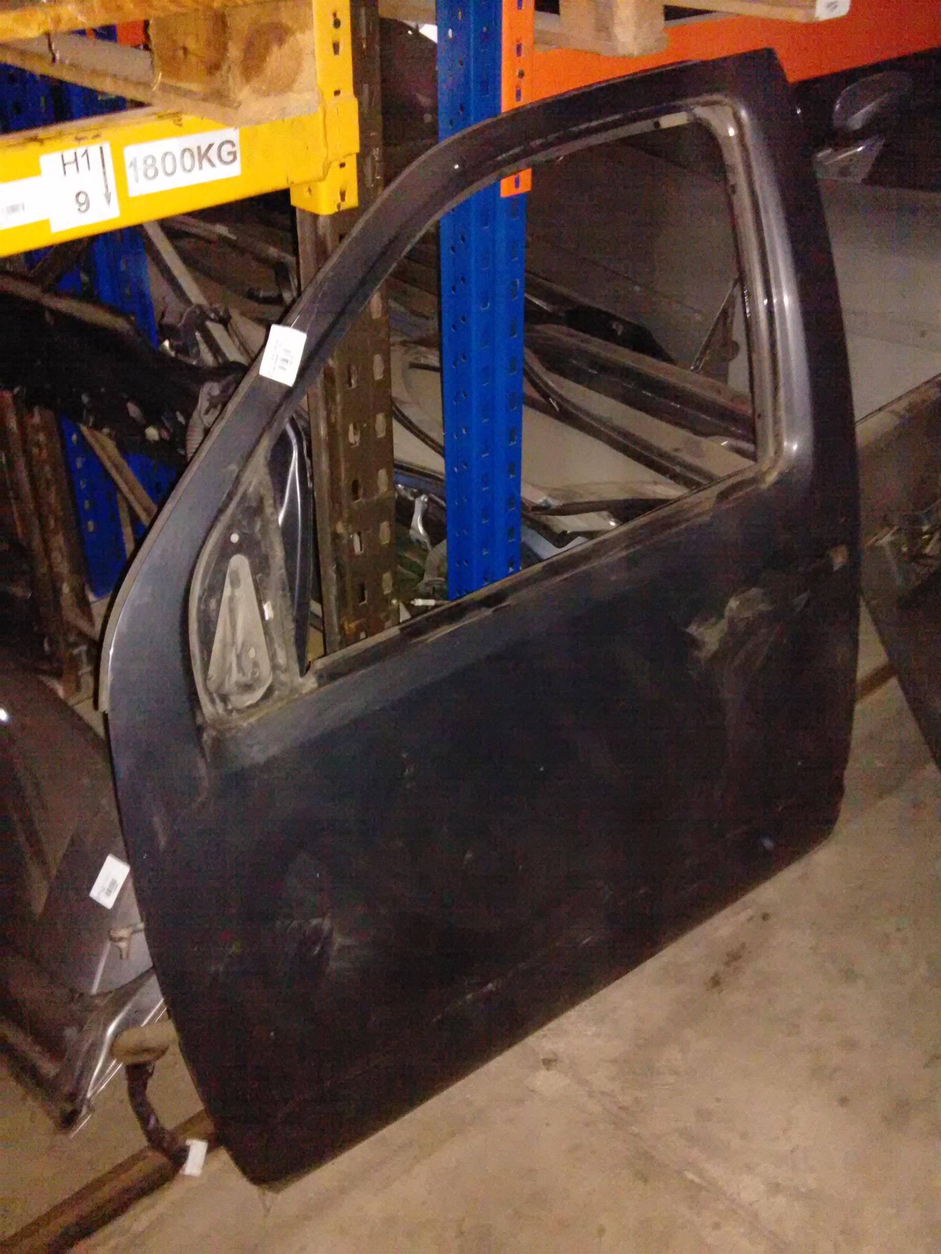 Usa stanga fata cu geam si cremaliera Nissan Navara, an 2007
